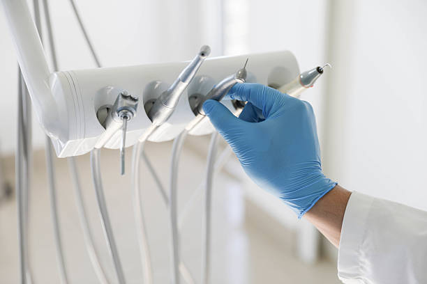 Professional Teeth Whitening technician working in Flagler Estates, FL